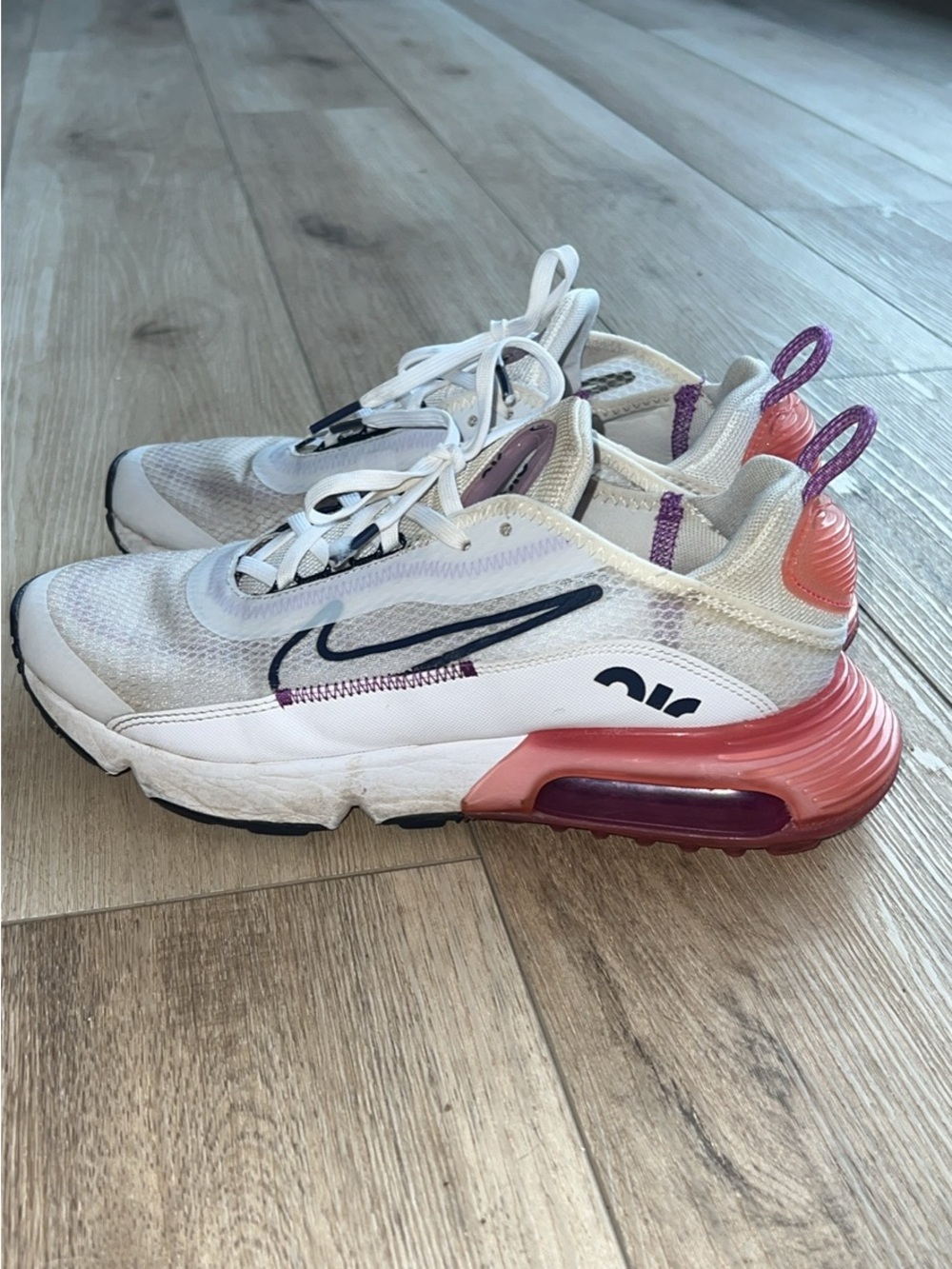 Nike White Athletic Shoes with Pink and Purple Accents